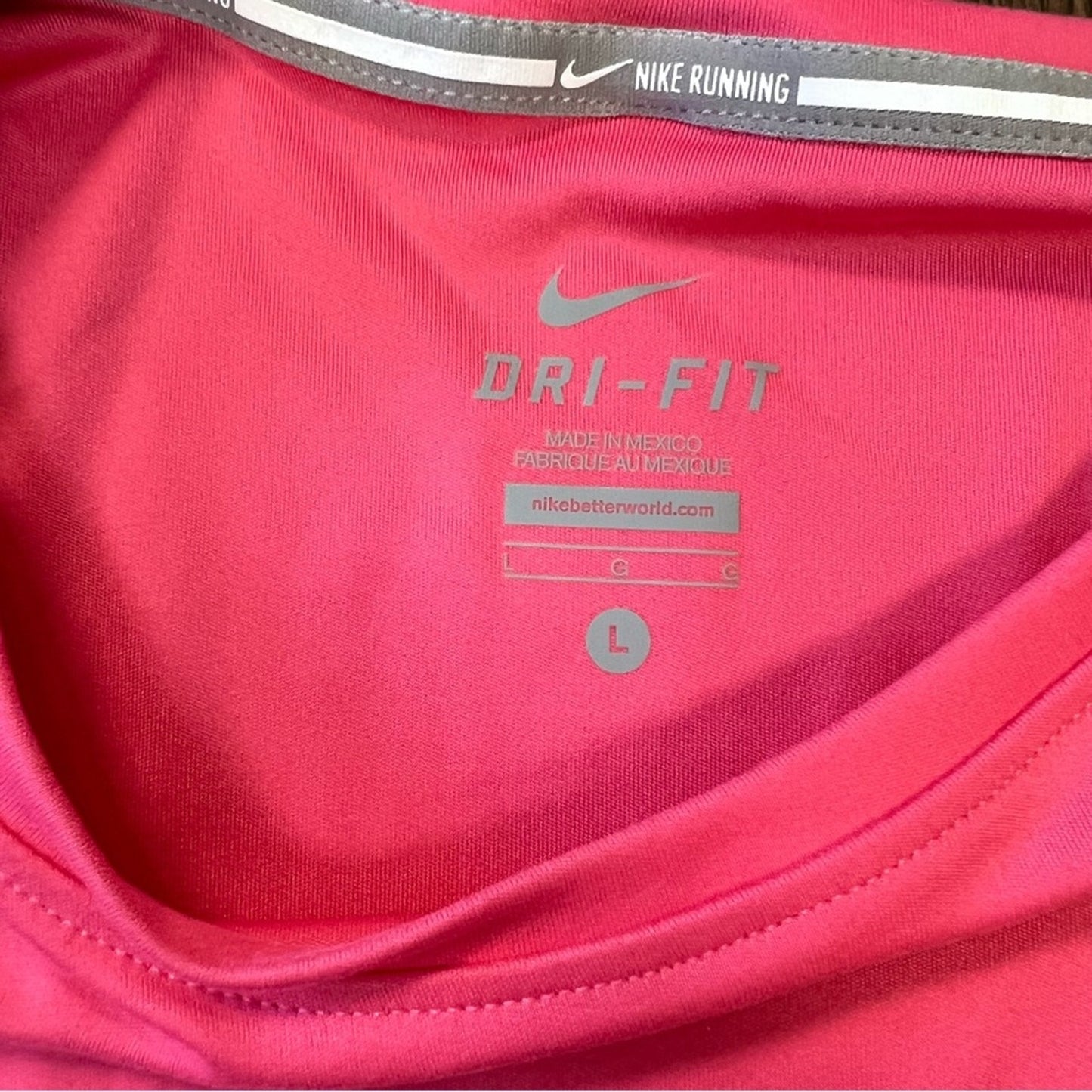 Nike dri -fit pink round neck running shirt SZ LG