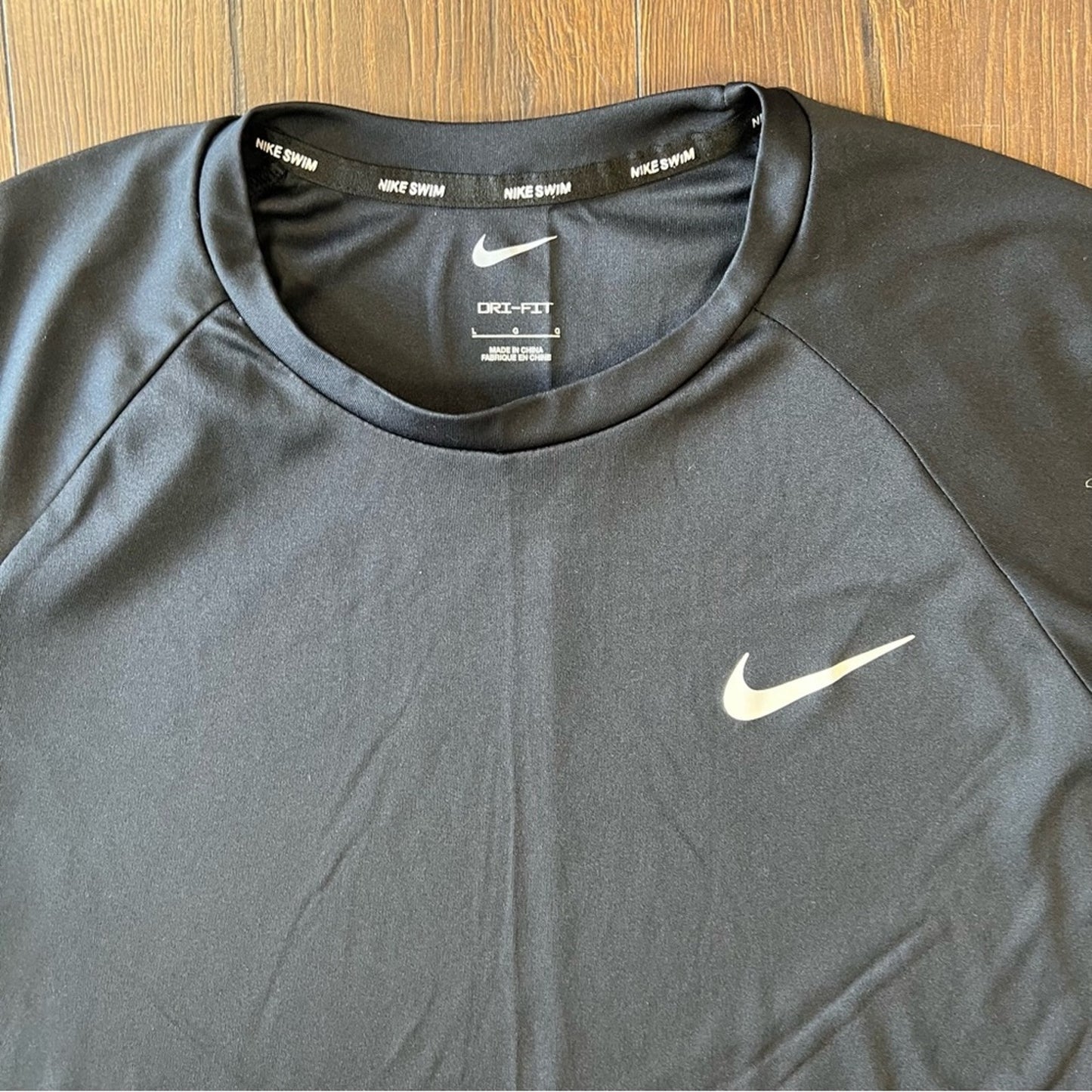 Nike swim UPF 40+ dri-fit tee SZ LG