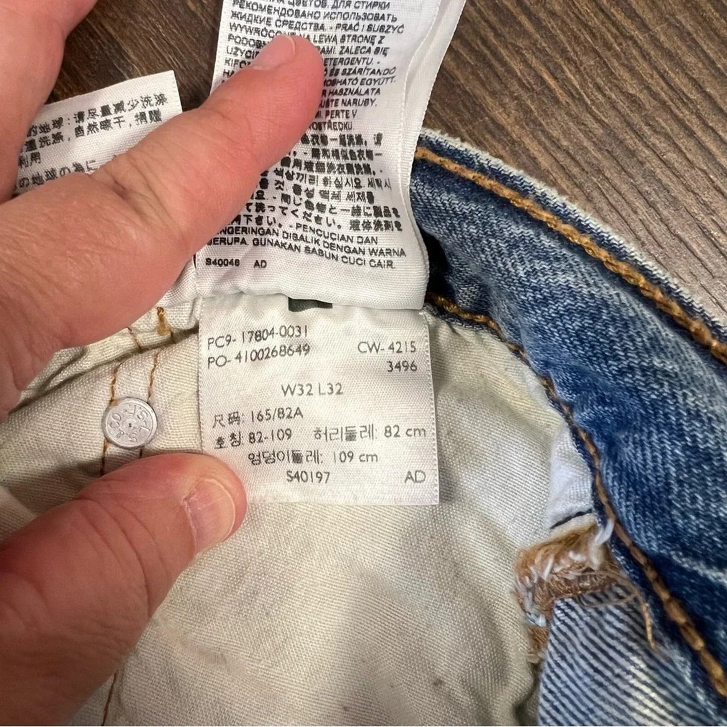 Levi’s 501 original fit light‎ wash patchwork jean SZ 32/12