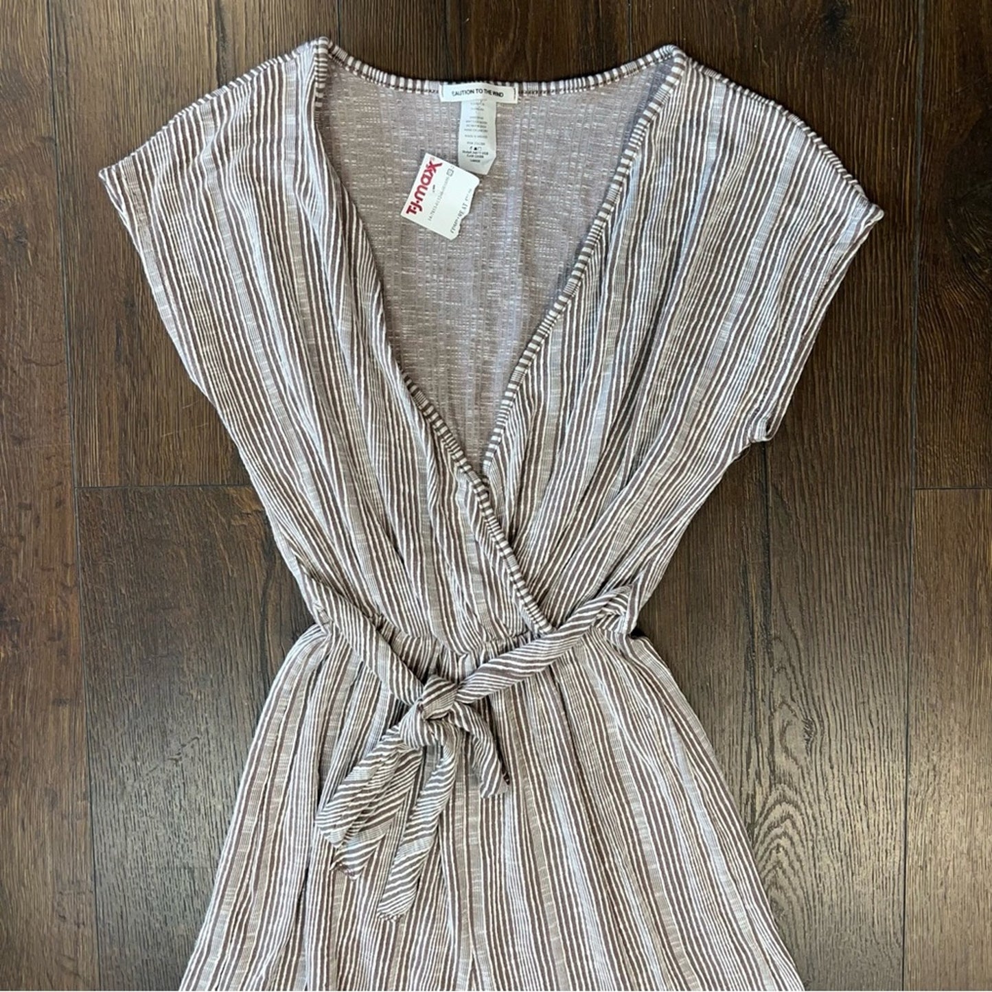 NEW Caution to the wind romper SZ LG