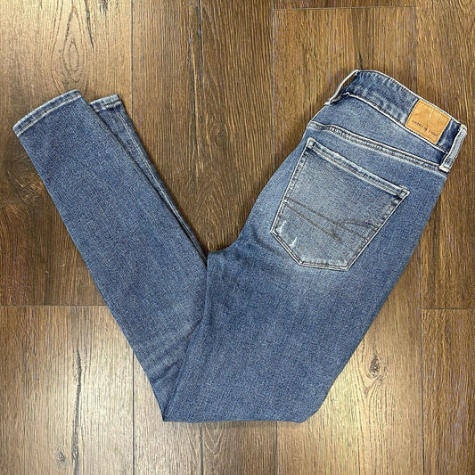American Eagle Medium Wash Distressed high-rise jegging SZ 4