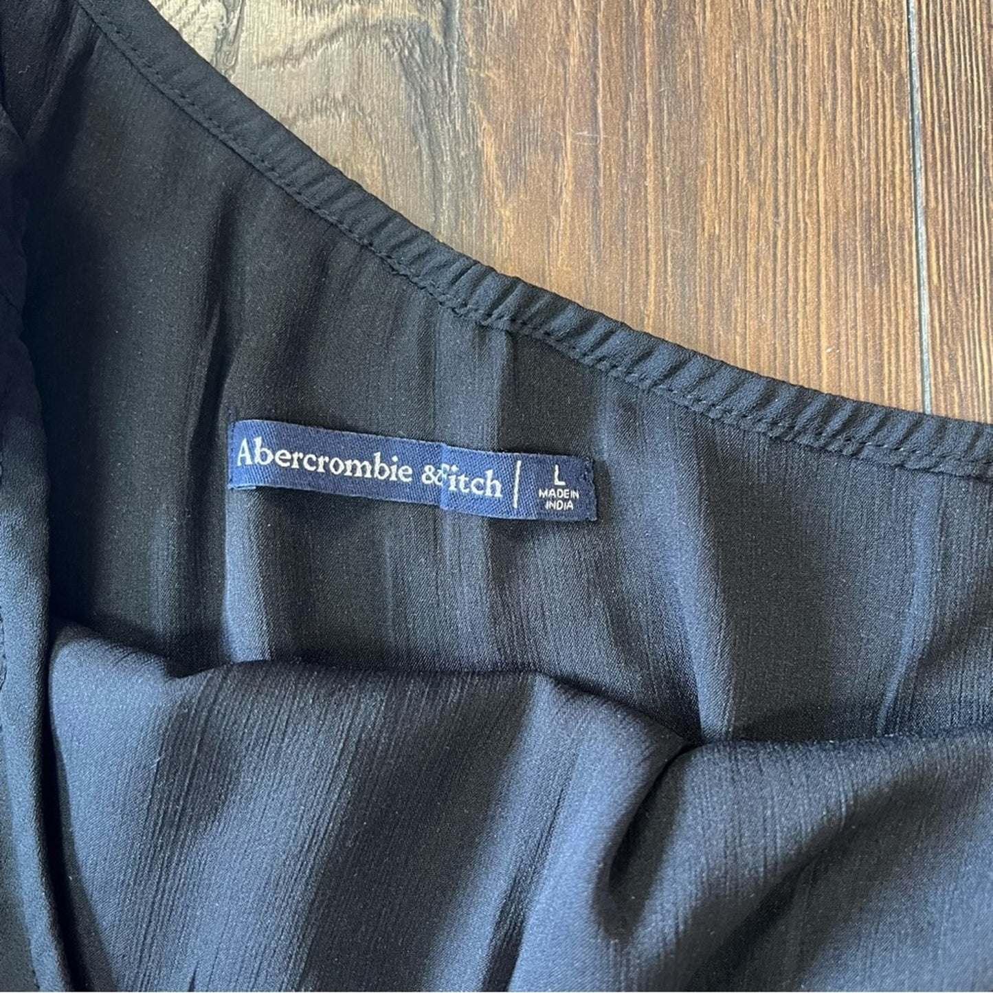 Abercrombie and Fitch, one sleeved bodysuit SZ LG