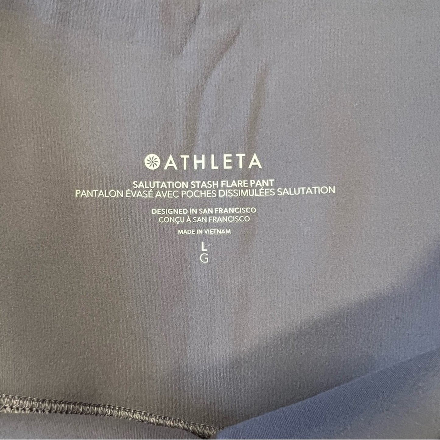 Athleta Salutation Stash Flare Pant SZ LG