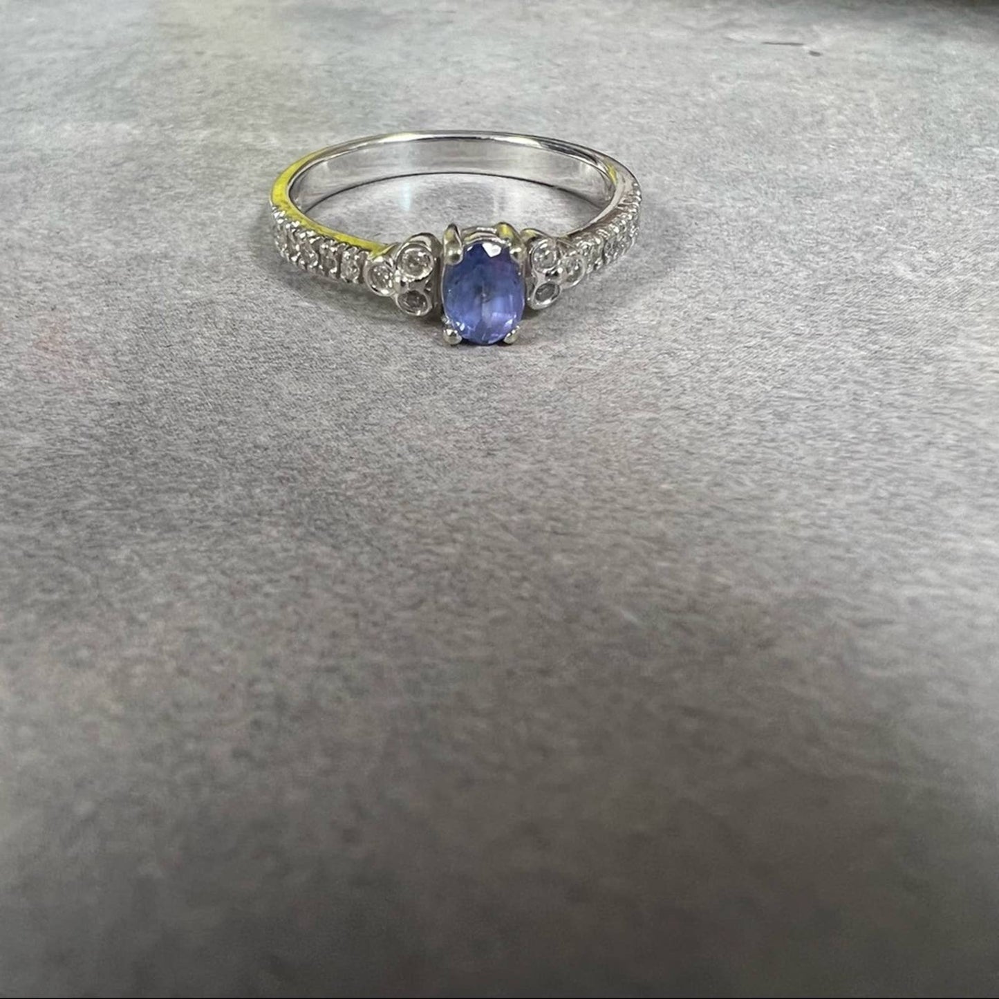 14kt white gold oval tanzanite ring with diamonds