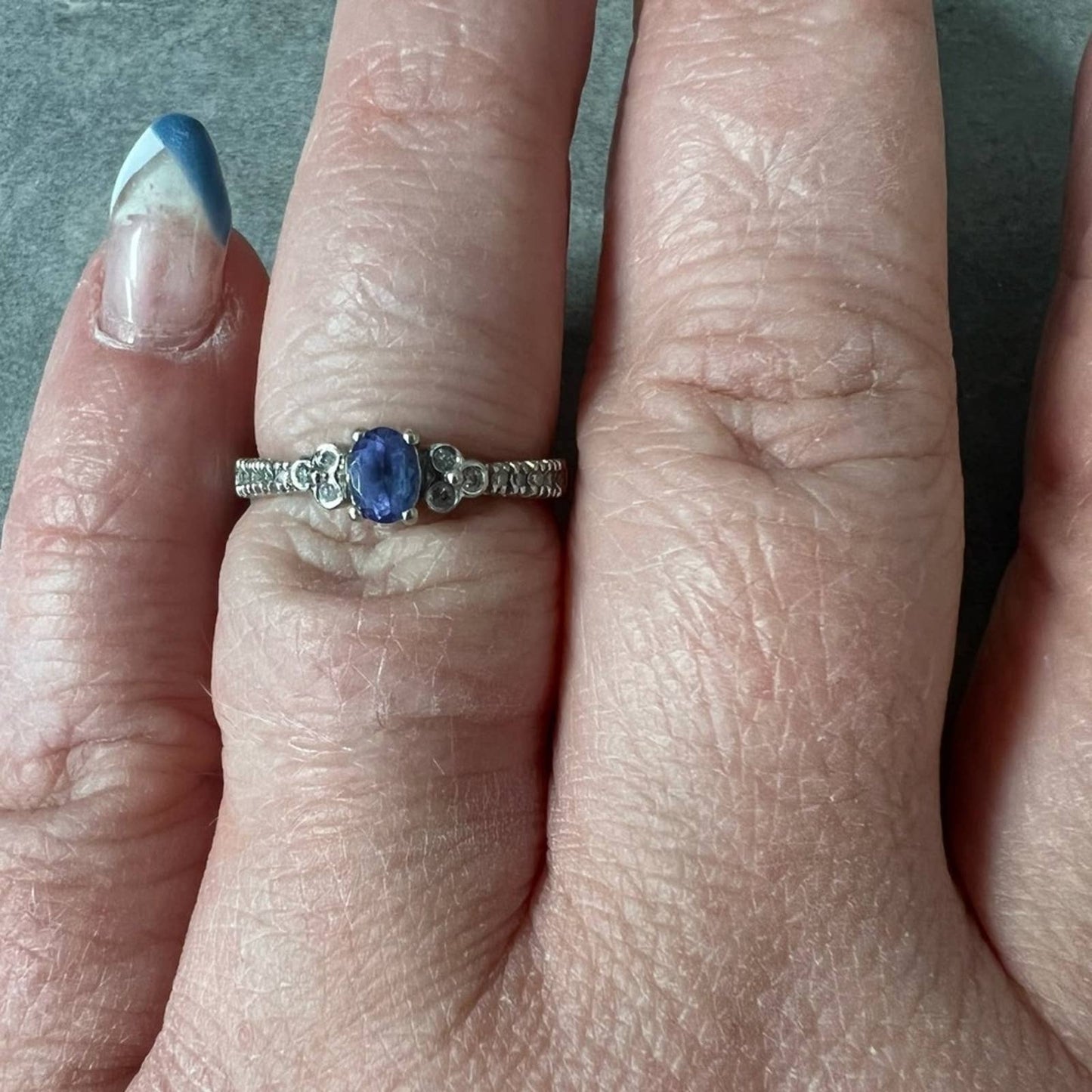 14kt white gold oval tanzanite ring with diamonds