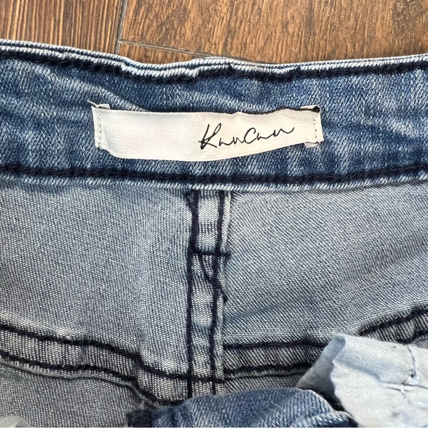 KanCan medium wash raw hem shorts SZ 7/27