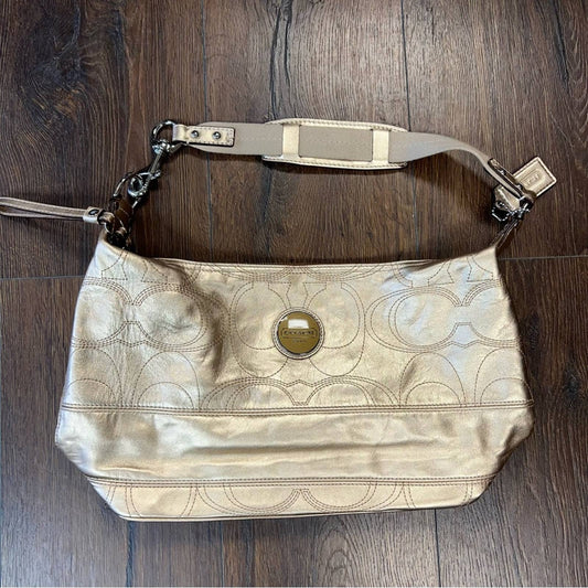 Coach signature stitch in metallic gold hobo