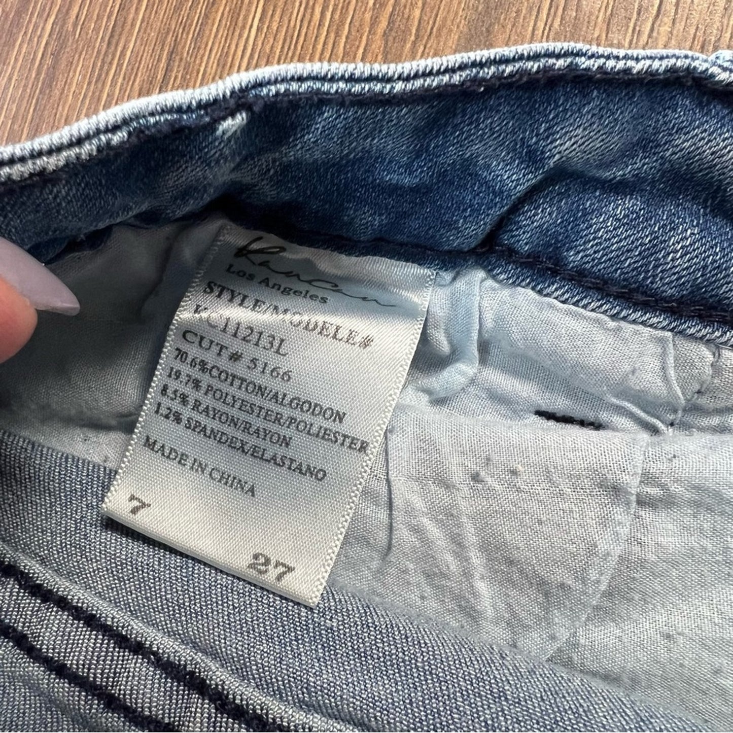 KanCan medium wash raw hem shorts SZ 7/27